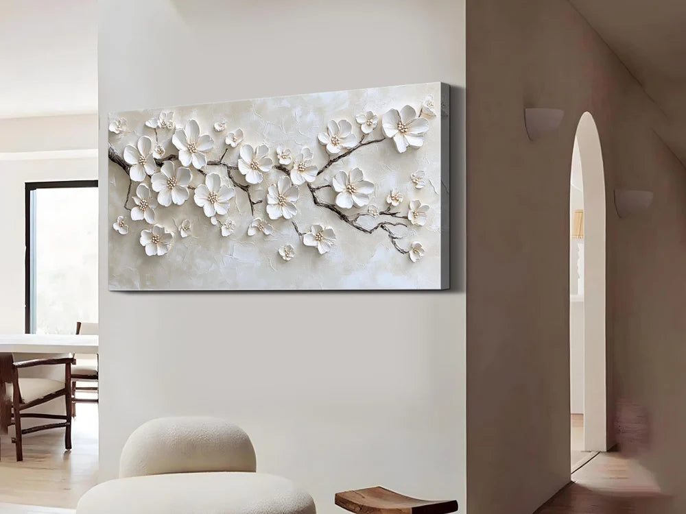 textured white blossom branch wall art with raised floral details