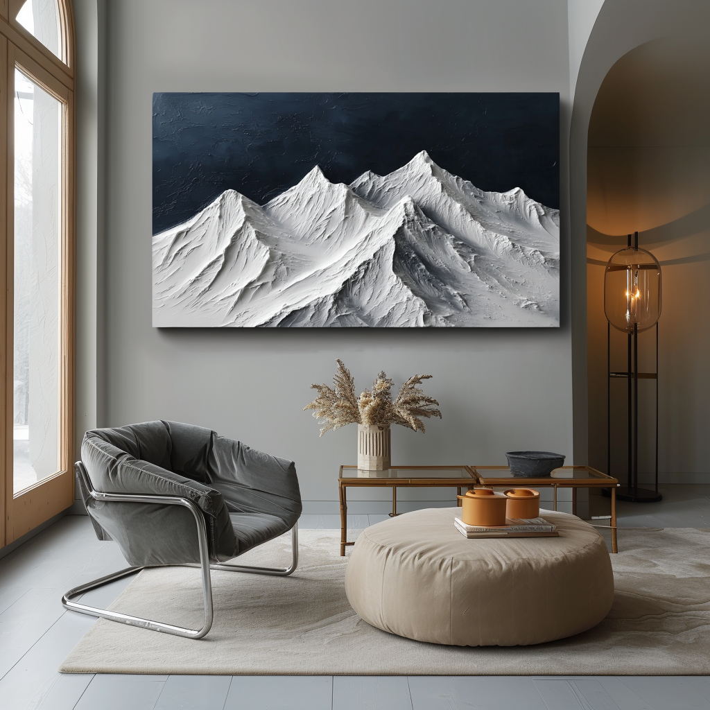 Textured snow-covered mountain range with white peaks and dark blue sky.