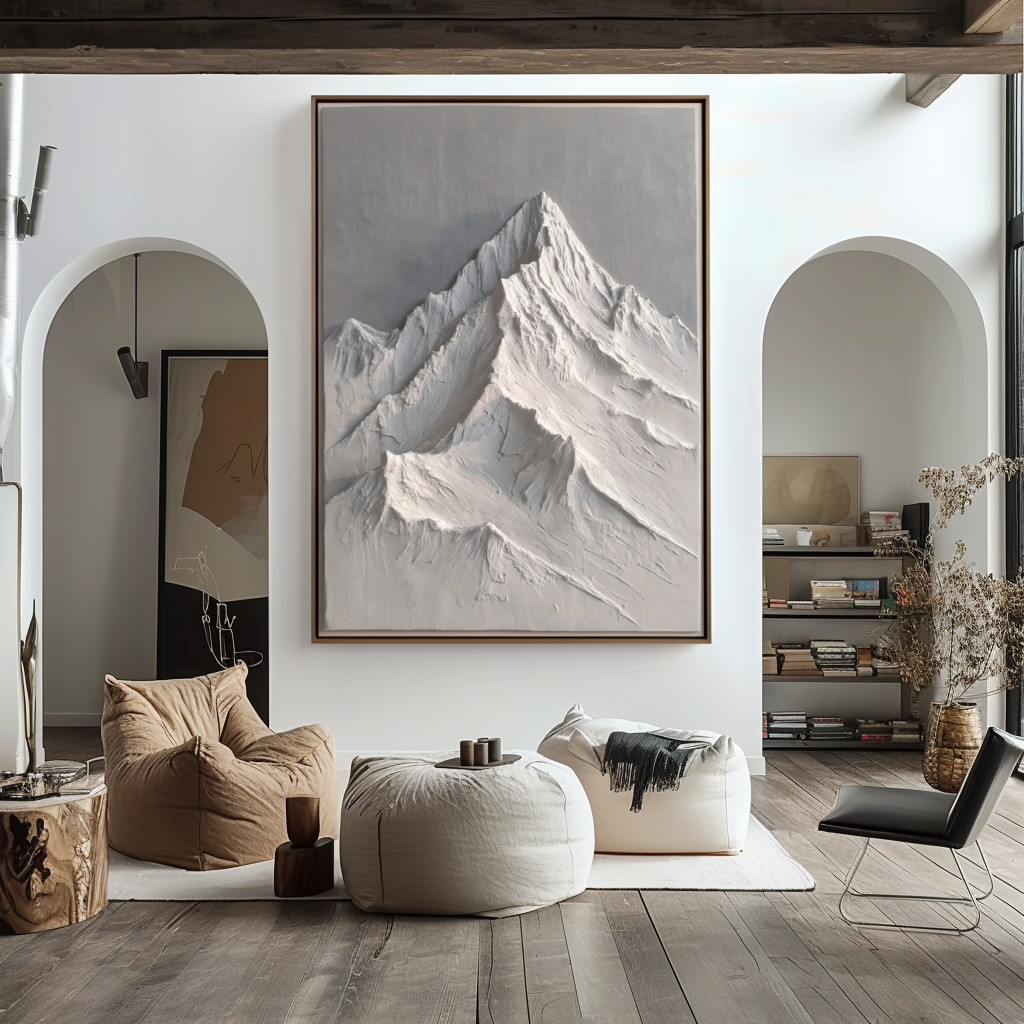 Textured snow-capped mountain landscape in white and gray tones with raised ridges.