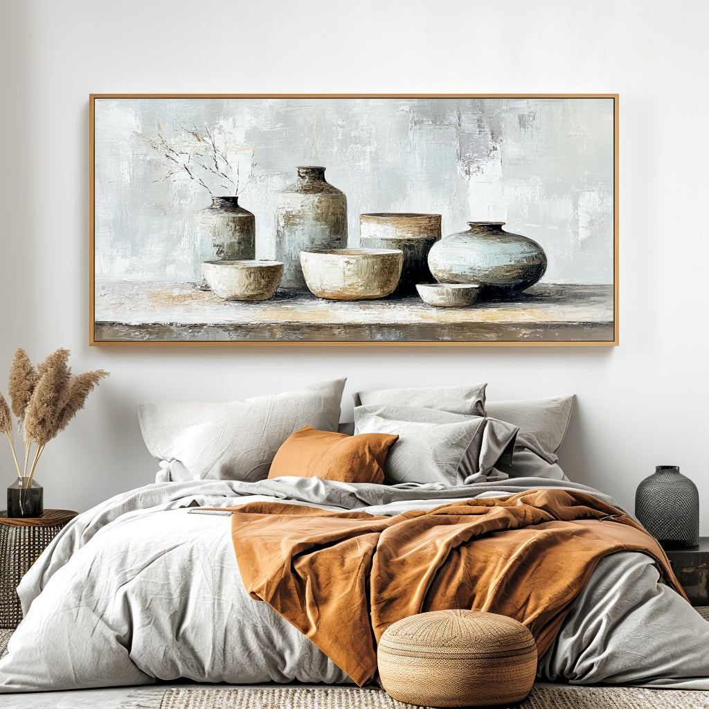 Still life painting of ceramic vases and bowls in neutral tones with a touch of dried grass.