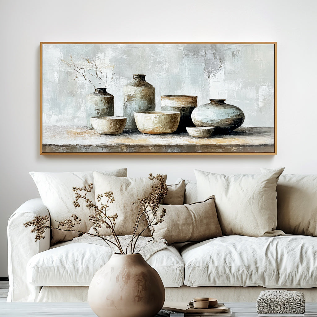Still life painting of ceramic vases and bowls in neutral tones with a touch of dried grass.