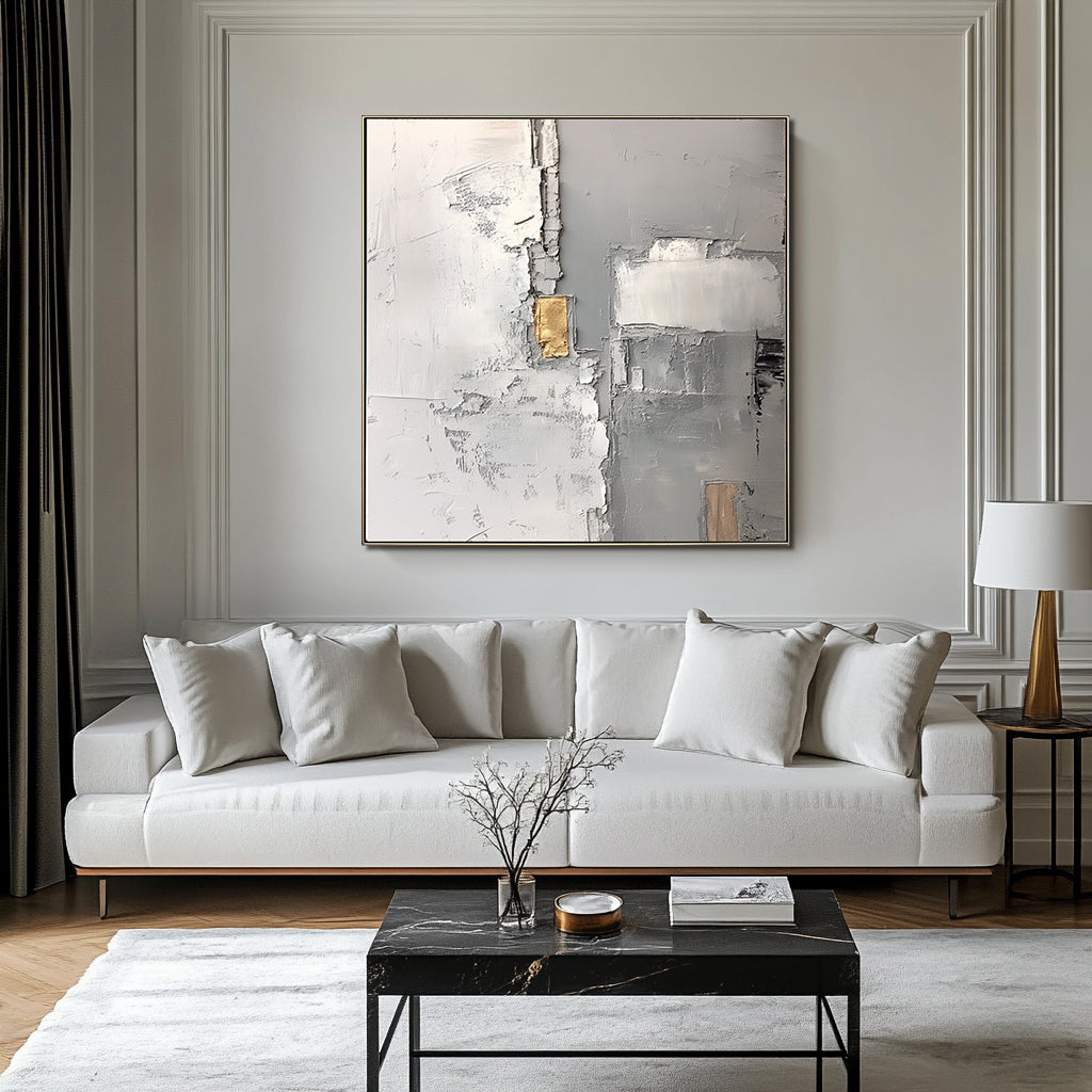 Abstract impasto art with textured gray and white surfaces, highlighted with metallic gold and beige accents, creating a modern and luxurious design.