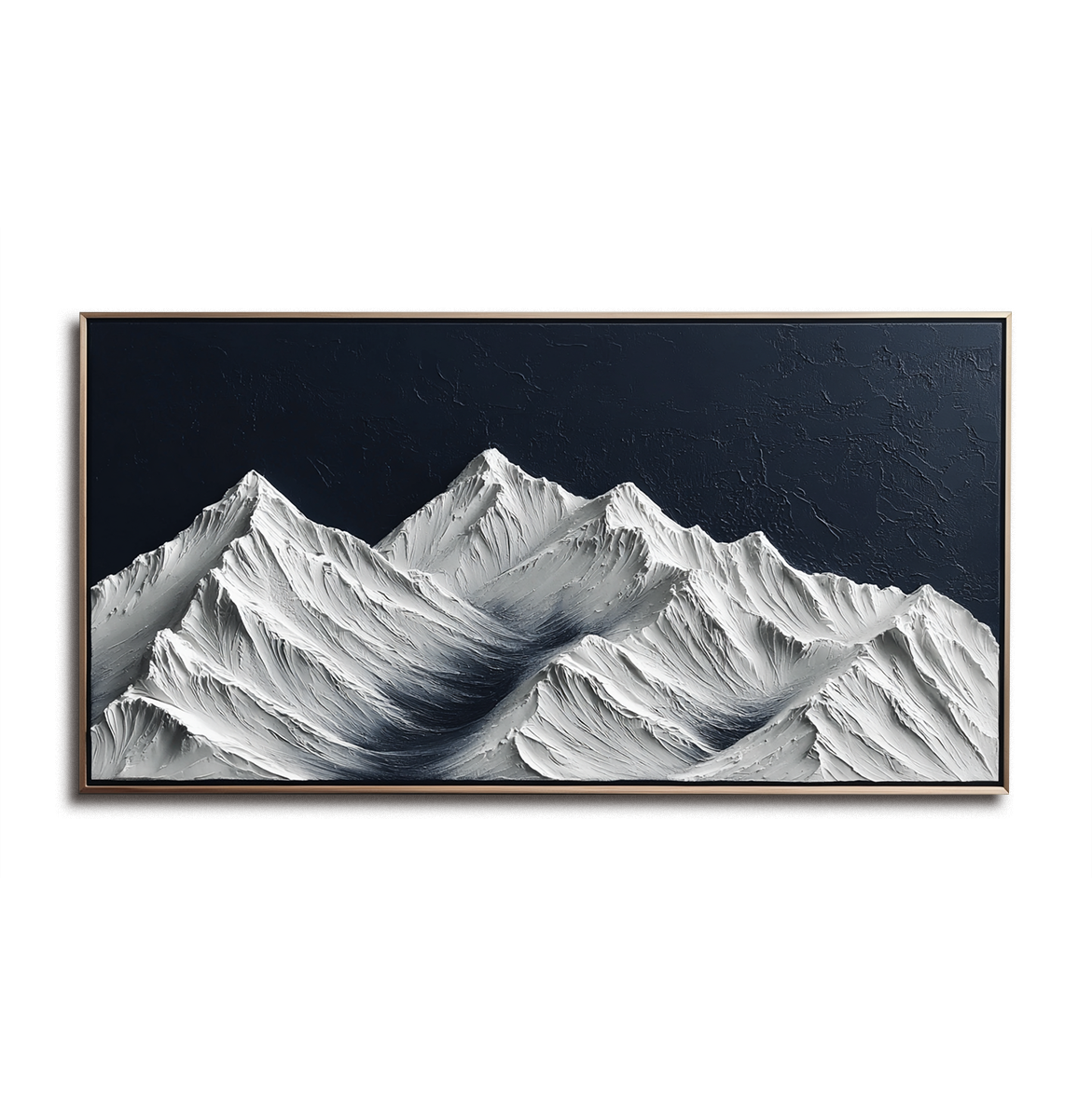 Textured snow-covered mountain landscape with white peaks and dark blue sky.