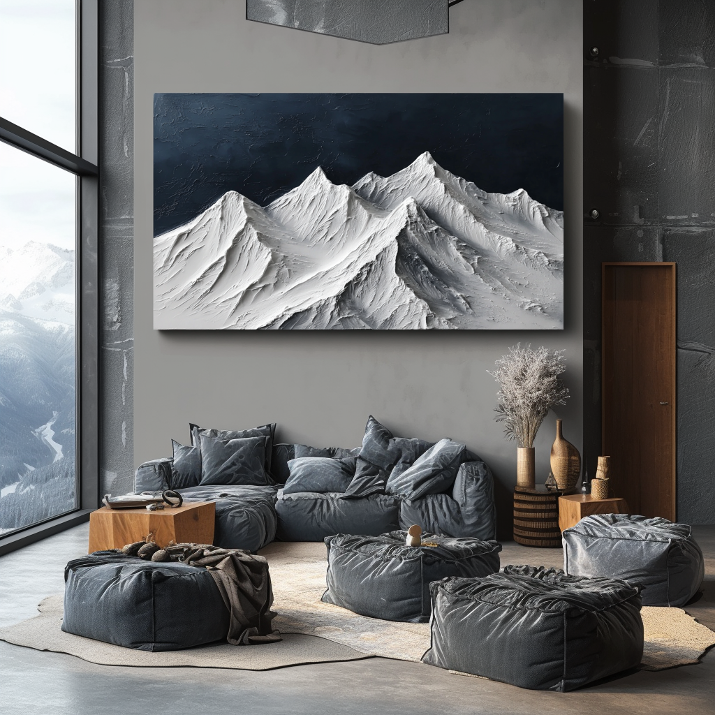 Textured snow-covered mountain range with white peaks and dark blue sky.