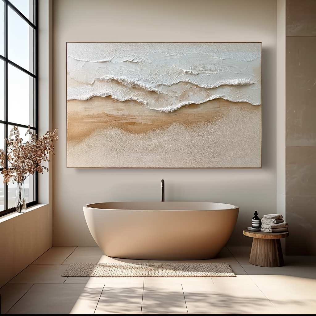 Textured ocean waves with white foam gently washing onto a sandy beach in soft beige and white tones.