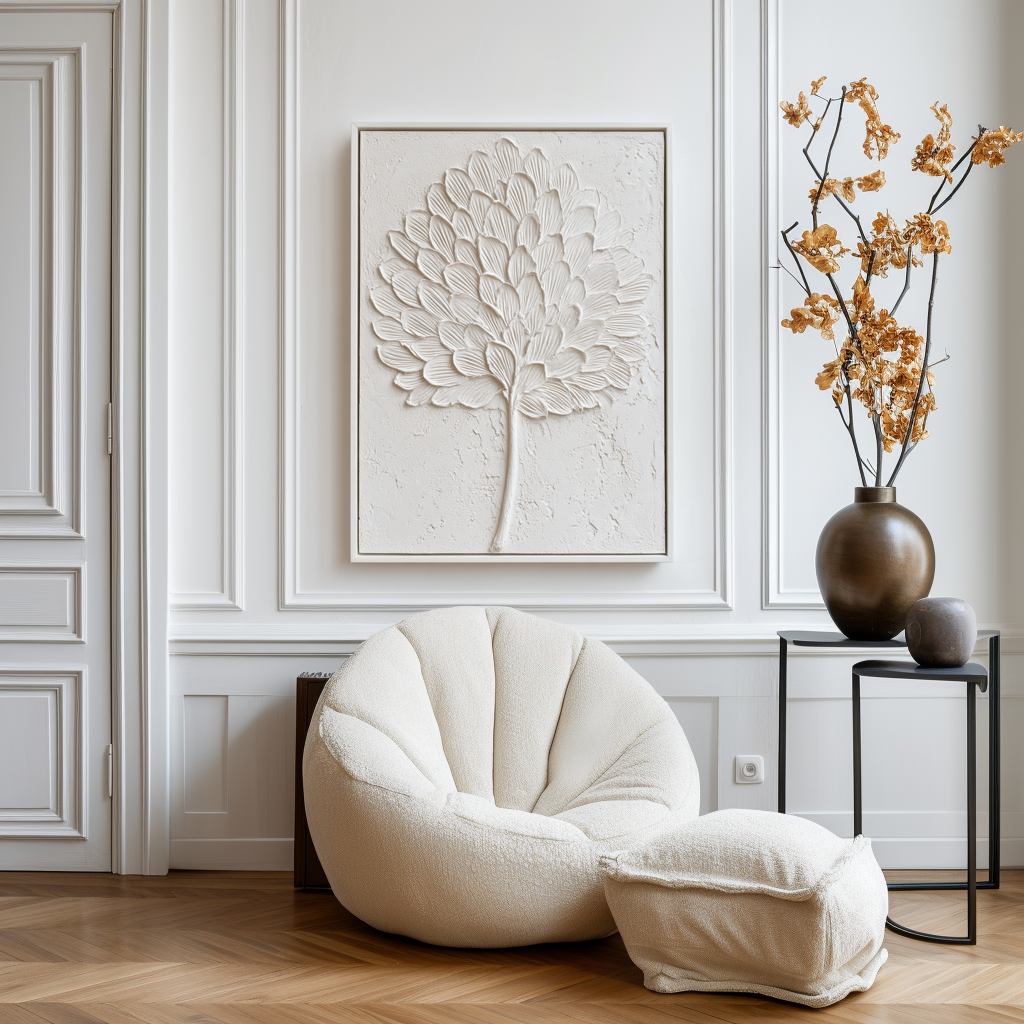 Textured white leaf art with sculpted details on a minimalist background.
