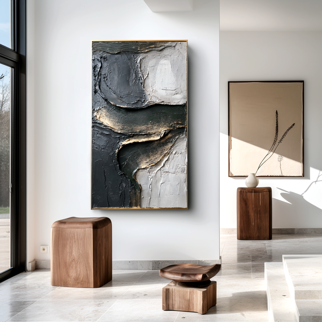 textured black, white, and gold abstract wall art with raised lines and curves