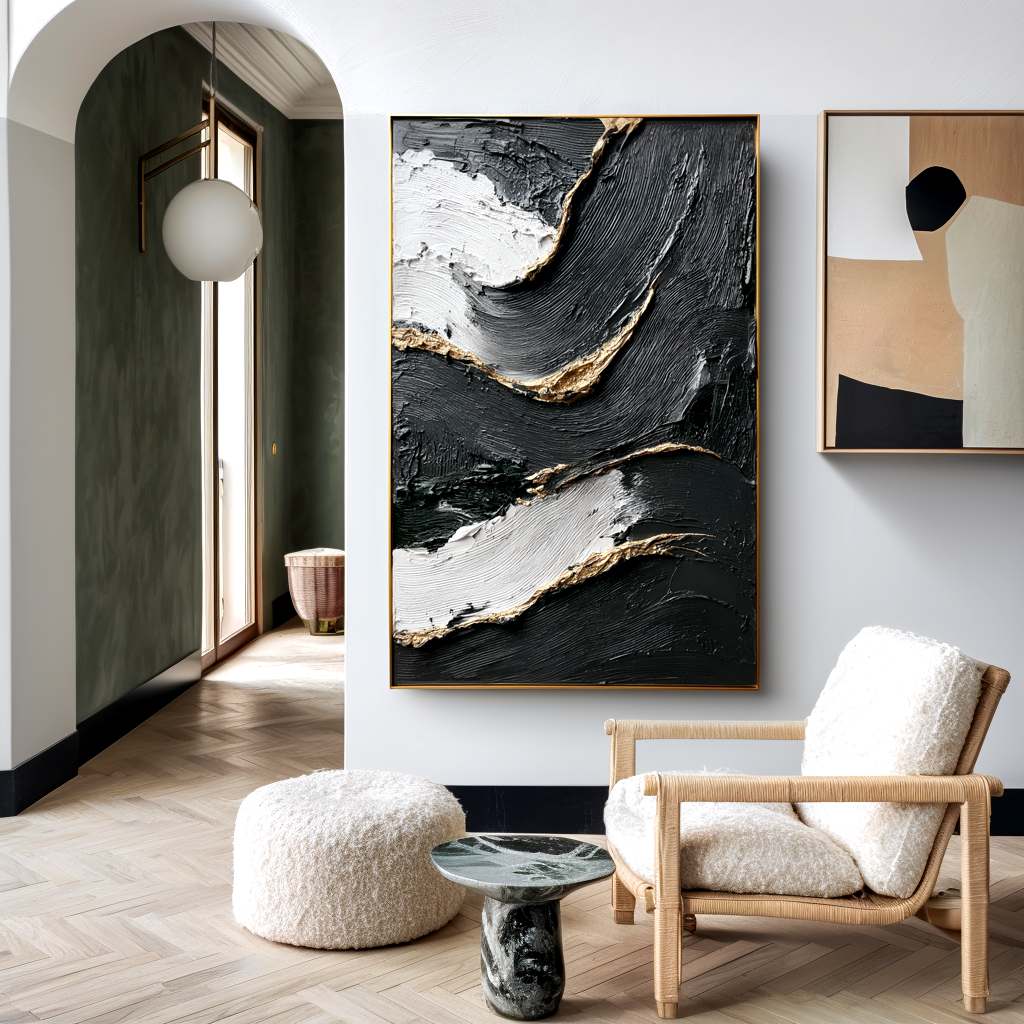 textured abstract black, white, and gold painting with flowing lines