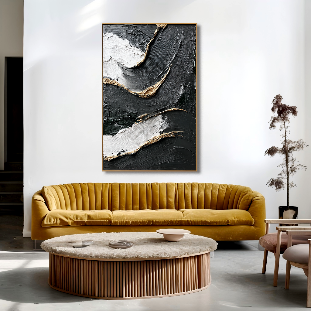 textured abstract black, white, and gold painting with flowing lines